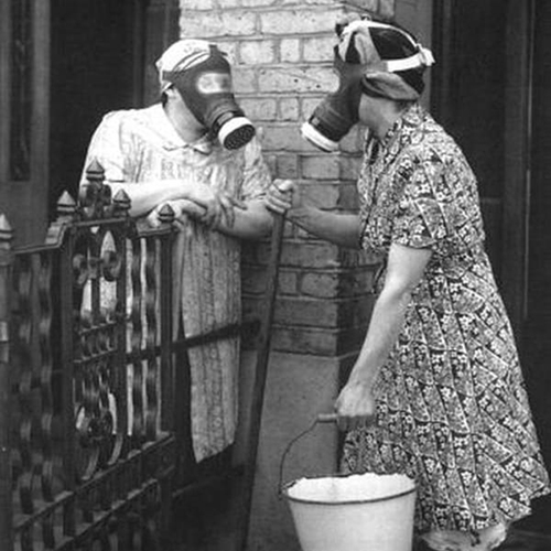 1940s Gas Mask Housewife Chatting over a fence